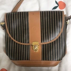 Medium vintage Fendi bag. Overall in good condition besides the straps